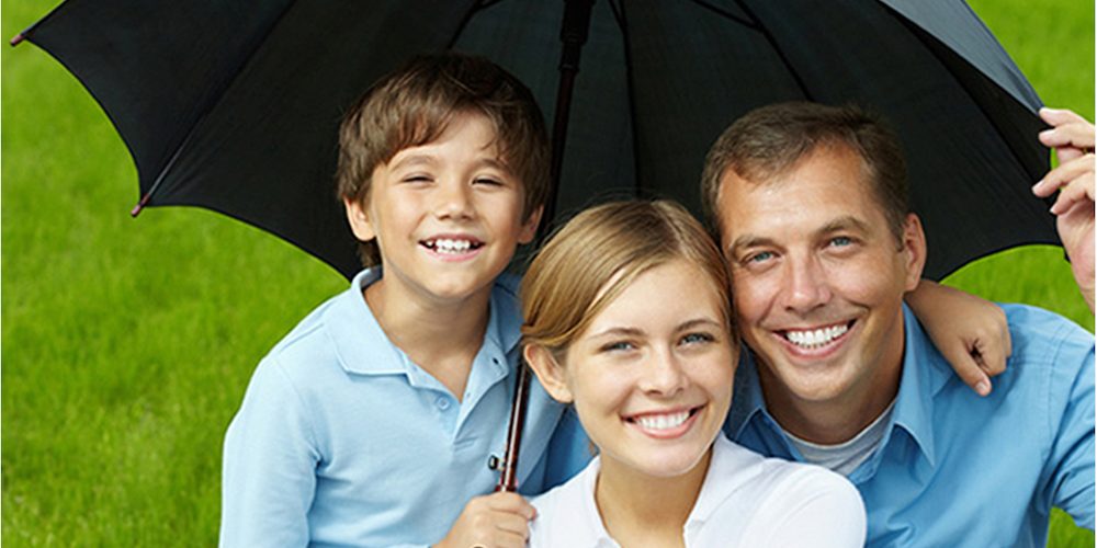 family under an umbrella