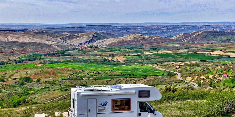 rv with beautiful country background